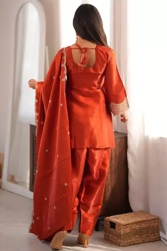 Rust orange embroidered glass roman silk kurta set with farshi salwar and designer dupatta