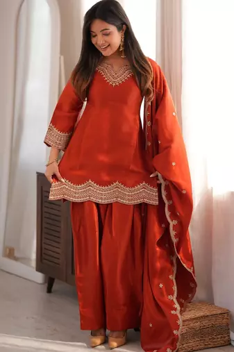 Rust orange embroidered glass roman silk kurta set with farshi salwar and designer dupatta