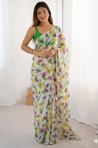 Green heavy chiffon printed lace border saree with blouse