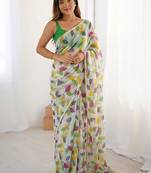 Green heavy chiffon printed lace border saree with blouse