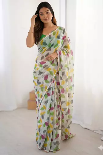 Green heavy chiffon printed lace border saree with blouse