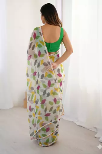Green heavy chiffon printed lace border saree with blouse