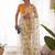 Yellow heavy chiffon printed lace border saree with blouse