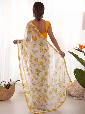Yellow heavy chiffon printed lace border saree with blouse 2