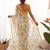 Yellow heavy chiffon printed lace border saree with blouse