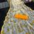 Yellow heavy chiffon printed lace border saree with blouse