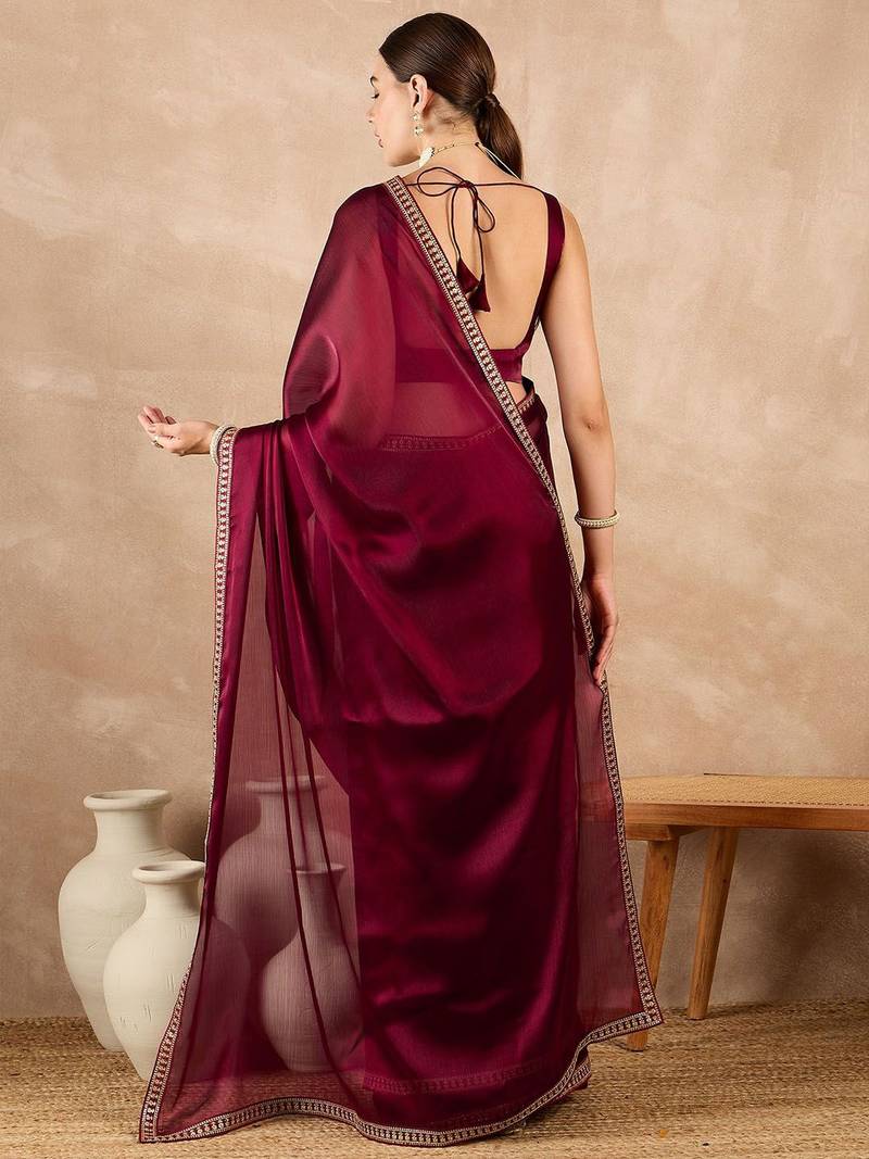 Magenta heavy rangoli with embroidery sequence fancy lace border with blouse