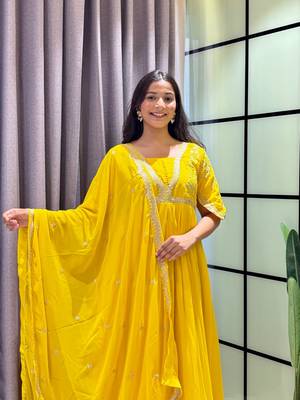 yellow color multi-sequin and zari embroidered faux blooming georgette gown set 1