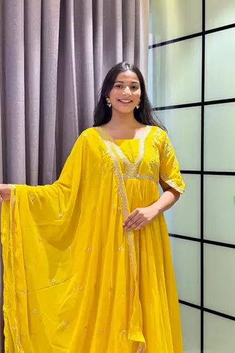 yellow color multi-sequin and zari embroidered faux blooming georgette gown set