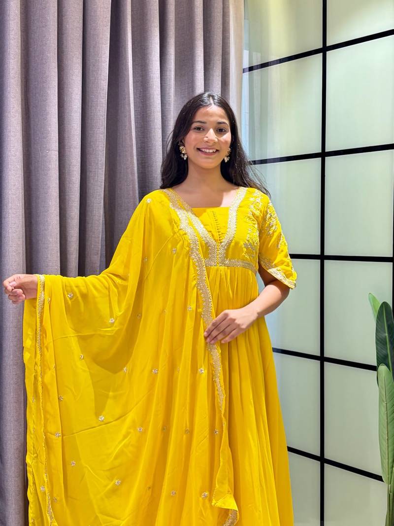 yellow color multi-sequin and zari embroidered faux blooming georgette gown set