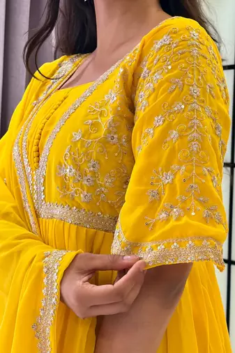 yellow color multi-sequin and zari embroidered faux blooming georgette gown set