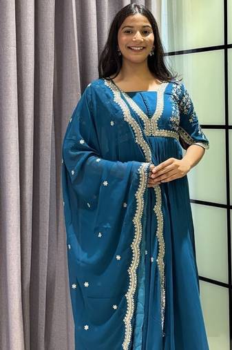 teal color multi-sequin and zari embroidered faux blooming georgette gown set
