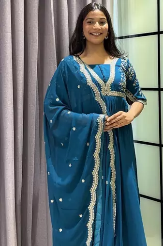 teal color multi-sequin and zari embroidered faux blooming georgette gown set