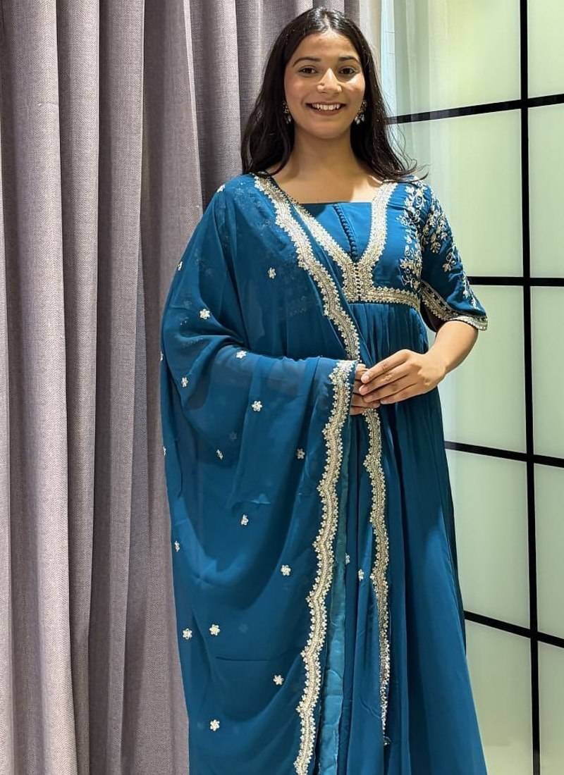 teal color multi-sequin and zari embroidered faux blooming georgette gown set