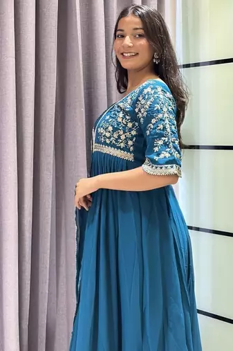 teal color multi-sequin and zari embroidered faux blooming georgette gown set