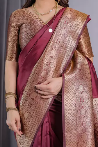 Maroon elegant zari woven banarasi silk sarees with attached blouse
