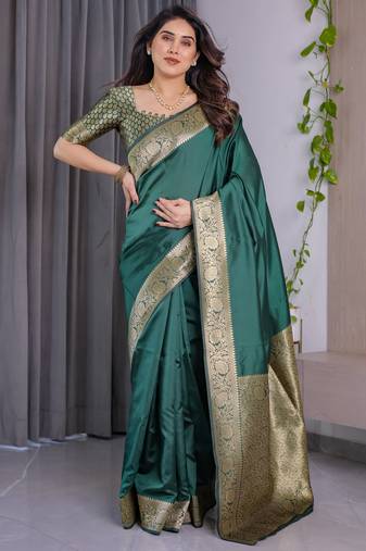 Green elegant zari woven banarasi silk sarees with attached blouse