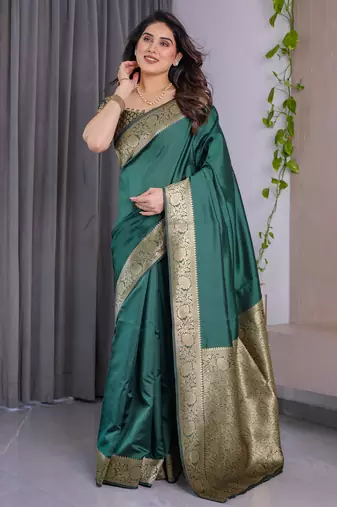 Green elegant zari woven banarasi silk sarees with attached blouse