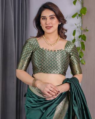 Green elegant zari woven banarasi silk sarees with attached blouse 4