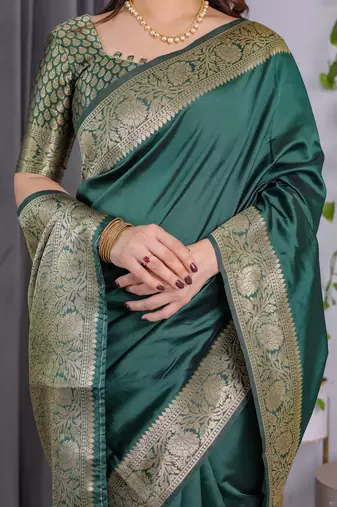 Green elegant zari woven banarasi silk sarees with attached blouse