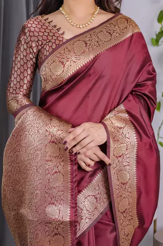 Maroon elegant zari woven banarasi silk sarees with attached blouse