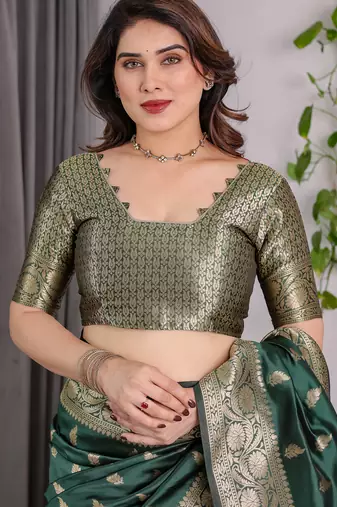 Green elegant zari woven banarasi silk sarees with attached blouse