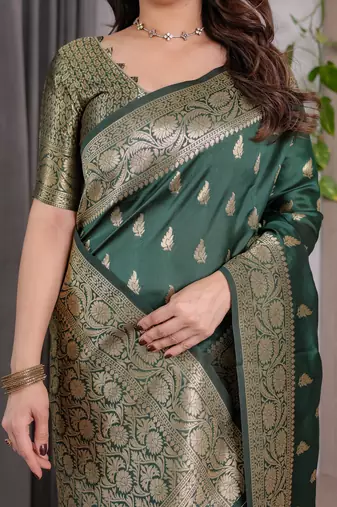 Green elegant zari woven banarasi silk sarees with attached blouse