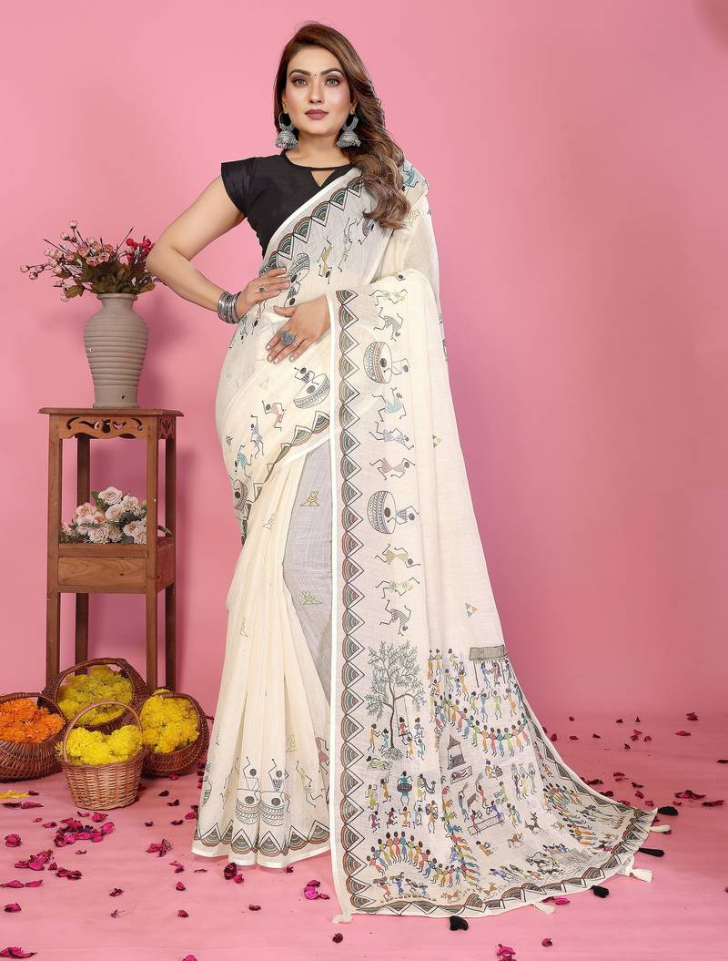 Soft linen cotton printed saree
with cotton tassles on pallu 
matching blouse