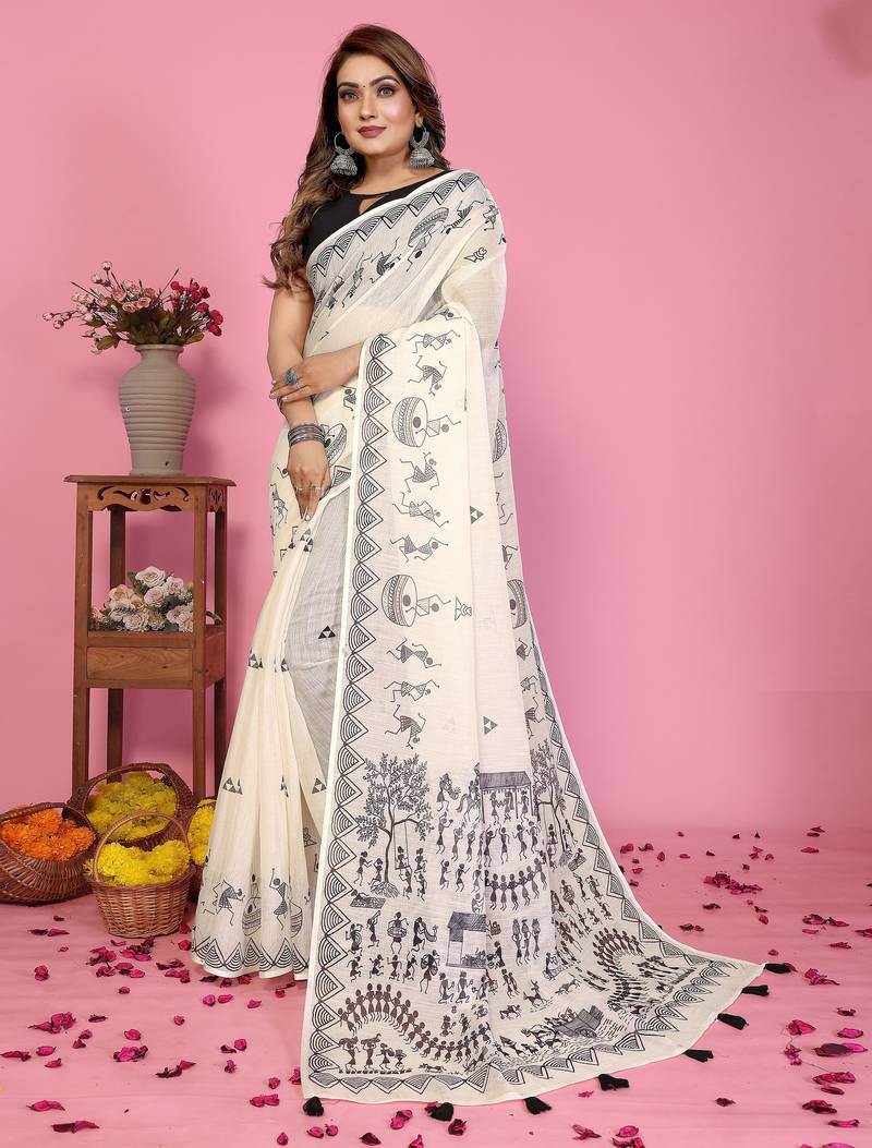 Soft linen cotton printed saree
with cotton tassles on pallu 
matching blouse