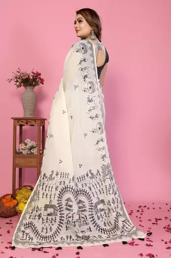 Soft linen cotton printed saree
with cotton tassles on pallu 
matching blouse