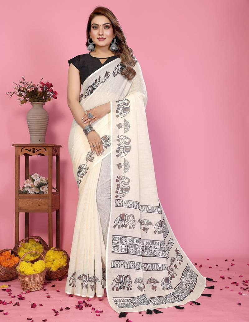Soft linen cotton printed saree
with cotton tassles on pallu 
matching blouse
