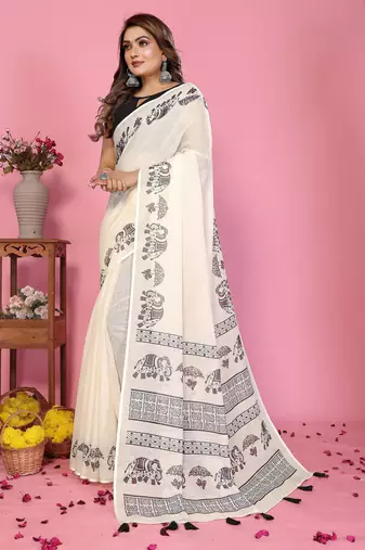 Soft linen cotton printed saree
with cotton tassles on pallu 
matching blouse