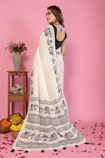 Soft linen cotton printed saree
with cotton tassles on pallu 
matching blouse