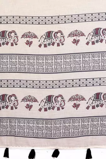 Soft linen cotton printed saree
with cotton tassles on pallu 
matching blouse