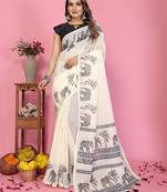 Soft linen cotton printed saree
with cotton tassles on pallu 
matching blouse