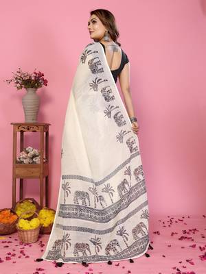 Soft linen cotton printed saree
with cotton tassles on pallu 
matching blouse 3