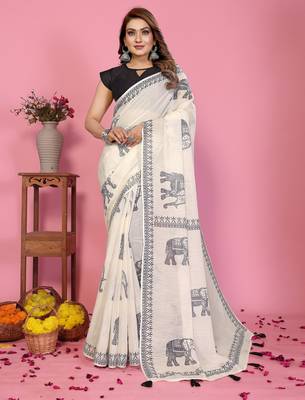 Soft linen cotton printed saree
with cotton tassles on pallu 
matching blouse 1