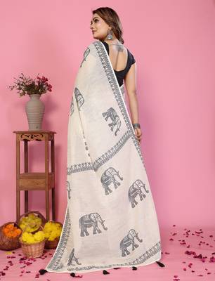 Soft linen cotton printed saree
with cotton tassles on pallu 
matching blouse 3