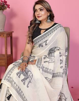 Soft linen cotton printed saree
with cotton tassles on pallu 
matching blouse 4