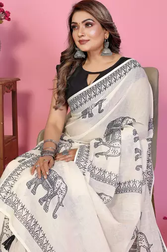 Soft linen cotton printed saree
with cotton tassles on pallu 
matching blouse