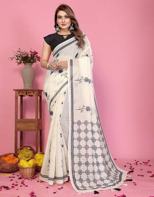 Soft linen cotton printed saree
with cotton tassles on pallu 
matching blouse 1