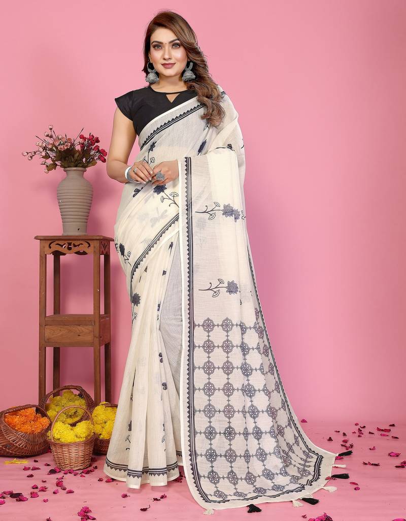 Soft linen cotton printed saree
with cotton tassles on pallu 
matching blouse