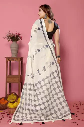 Soft linen cotton printed saree
with cotton tassles on pallu 
matching blouse