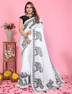 Soft linen cotton printed saree
with cotton tassles on pallu 
matching blouse 1