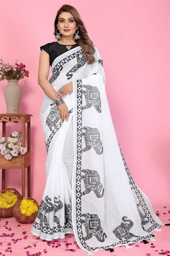 Soft linen cotton printed saree
with cotton tassles on pallu 
matching blouse