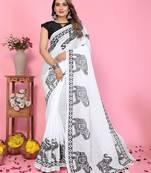 Soft linen cotton printed saree
with cotton tassles on pallu 
matching blouse