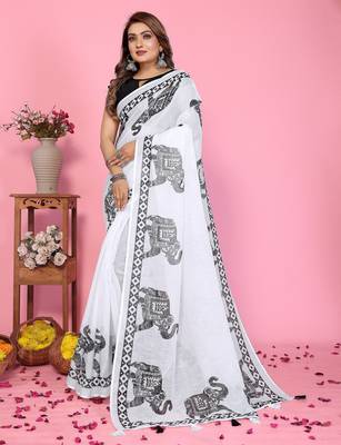 Soft linen cotton printed saree
with cotton tassles on pallu 
matching blouse 2