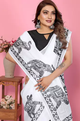 Soft linen cotton printed saree
with cotton tassles on pallu 
matching blouse