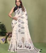 Soft linen cotton printed saree
with cotton tassles on pallu 
matching blouse