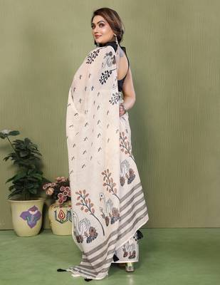 Soft linen cotton printed saree
with cotton tassles on pallu 
matching blouse 3